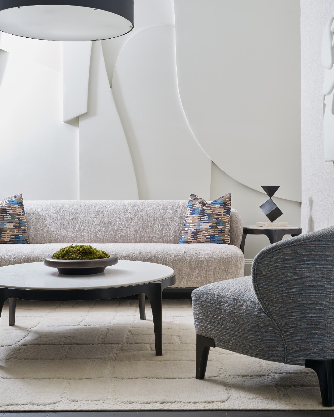 beige sofa with gray armchair